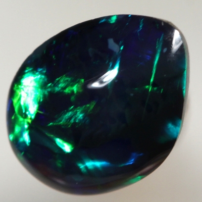SOLID BLACK OPAL  Bright and rich rolling flashes of turquoise, green and blue